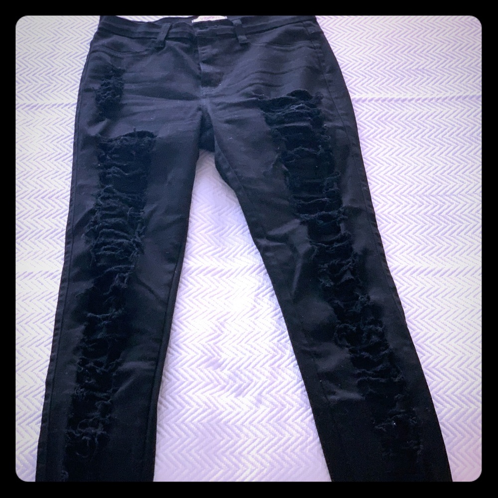 Ripped black hipster sexy jeans in black